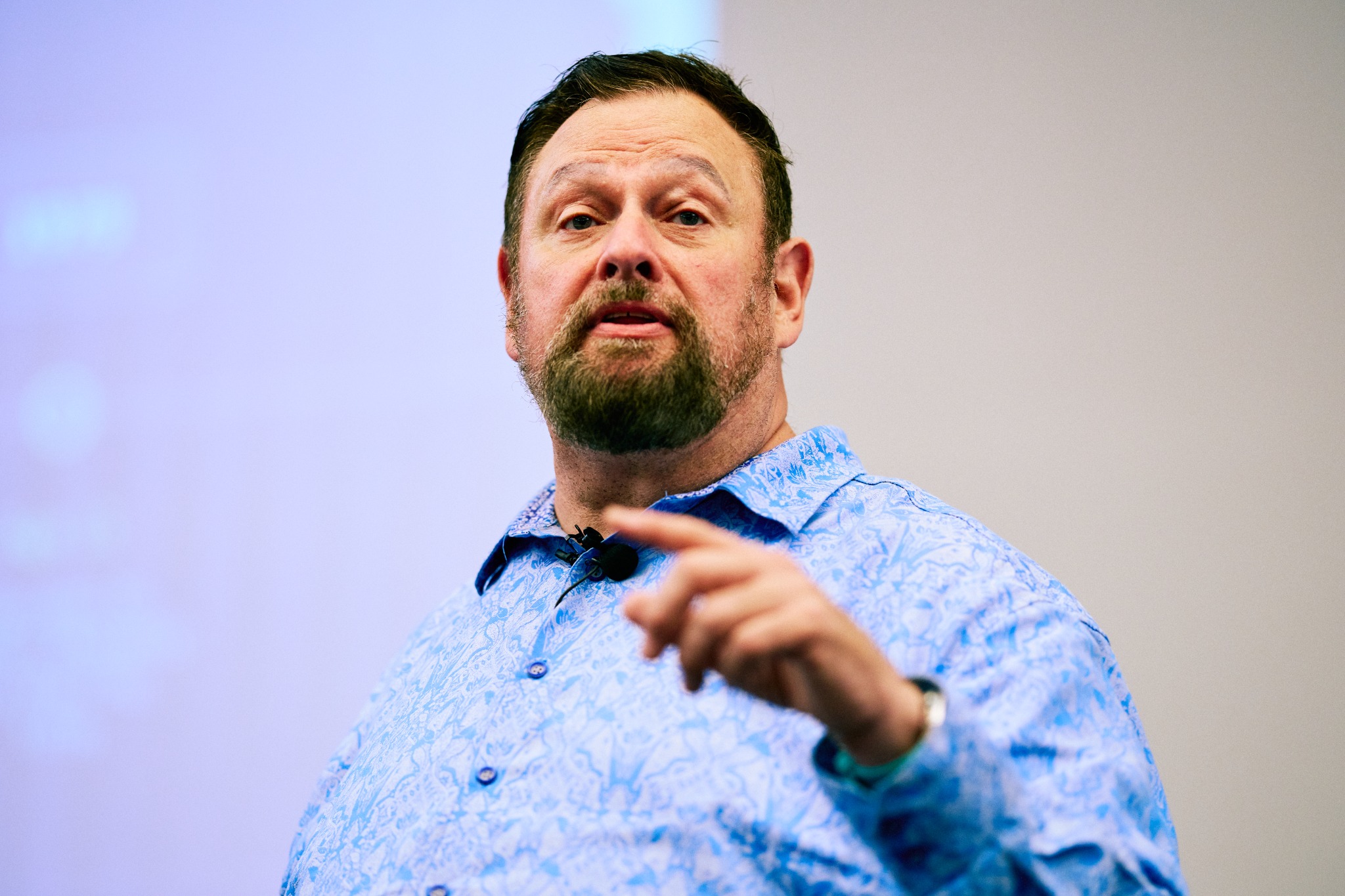 Wally Bressler presenting to an audience at the Goal Achievers Summit